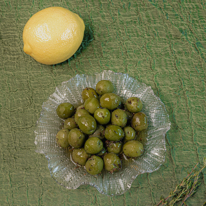 Marinated green olives and fresh lemon, ready to share